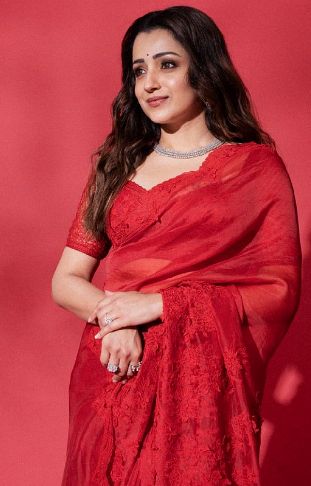 Trisha often graces traditional events and red carpets in exquisite Kanjeevaram sarees. Her choice of vibrant colors, intricate design saree are graceful