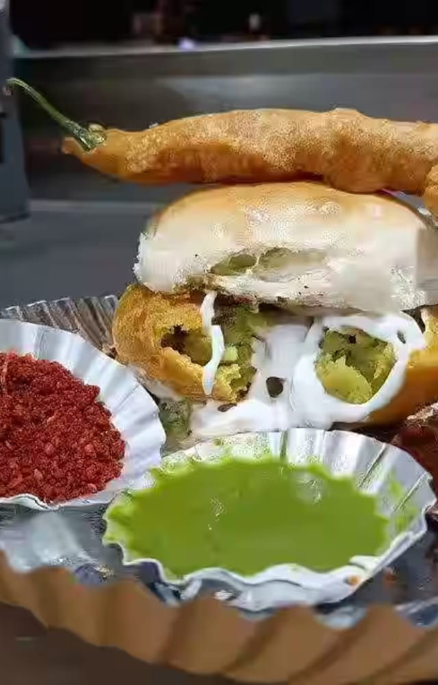 Tired of having the same old, boring vada pav? Add a cheesy twist to Mumbai`s favorite street food at Navdurga Vada Pav, near Central Mall.