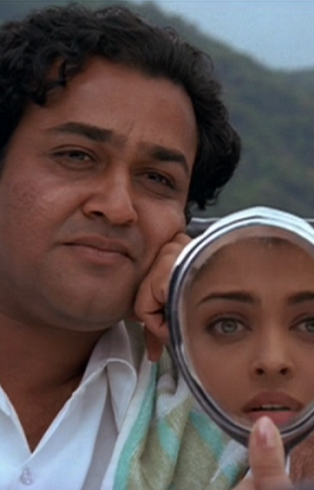 In this Tamil film by Mani Ratnam, Mohanlal`s portrayal of Anandan, inspired by MGR, is widely praised and highly acclaimed.