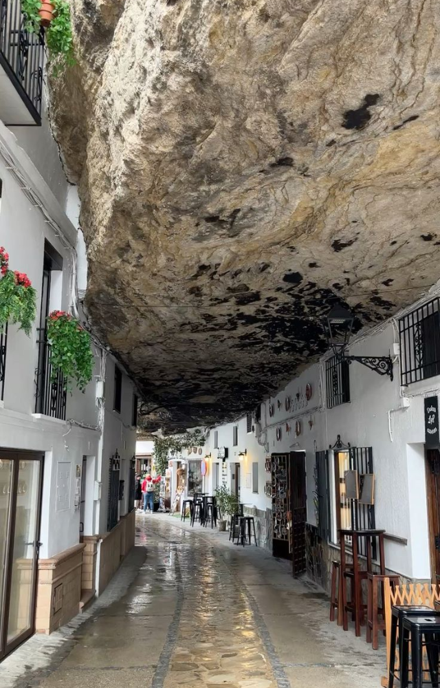 This Spanish town is built into giant overhanging cliffs—many homes are carved directly into the rock walls.
