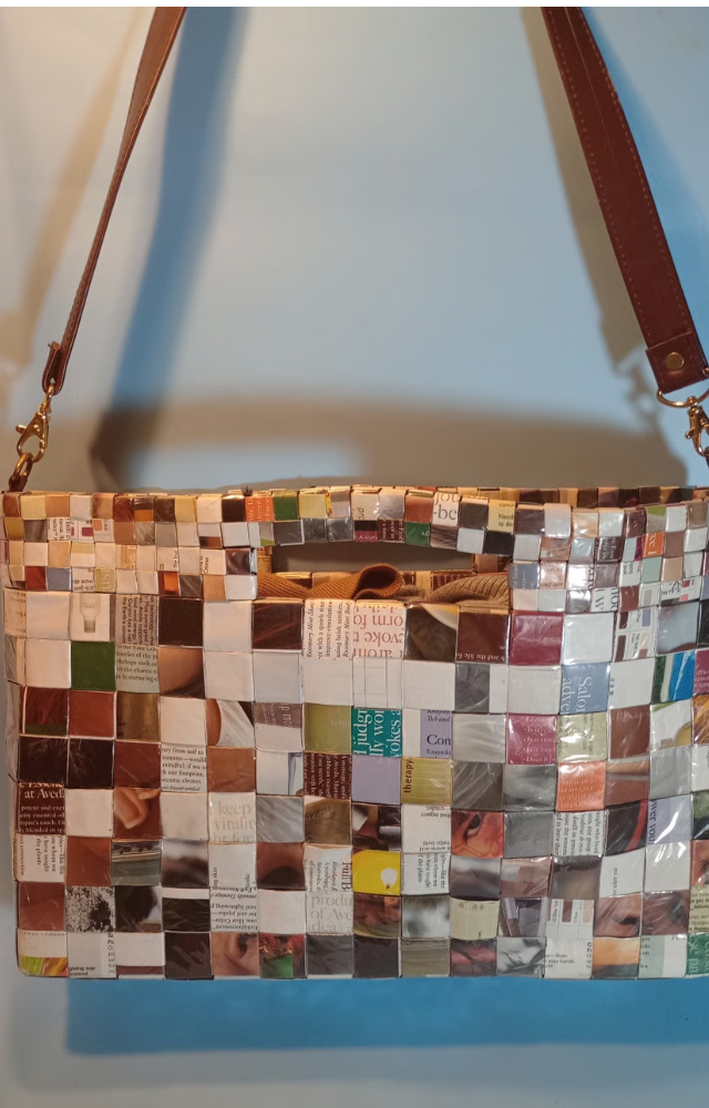 Made entirely from recycled candy wrappers, this colorful clutch turns trash into a statement and retails for around 60,000.
