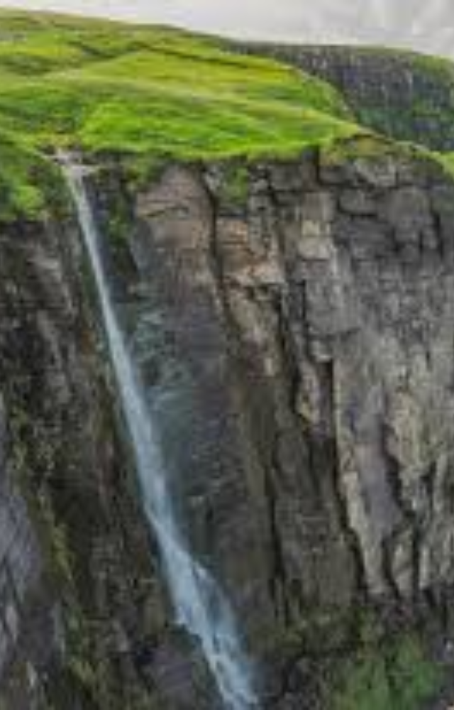 With powerful Atlantic winds, several seasonal streams flowing off the cliffs appear to float upwards, misting the air dramatically.
