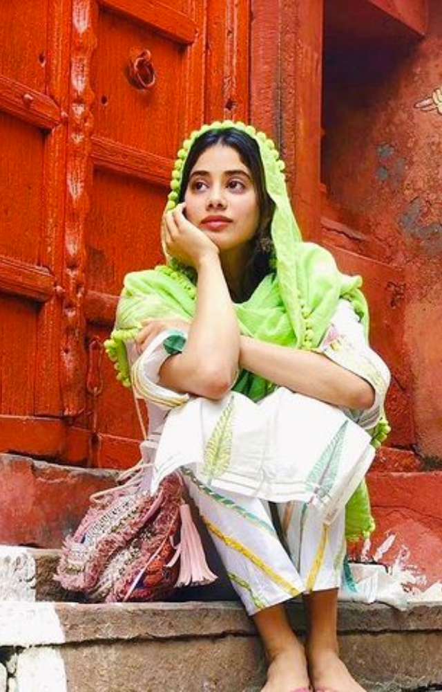 Janhvi Kapoor radiates elegance in a green ensemble, showcasing simplicity with a touch of sophistication.
