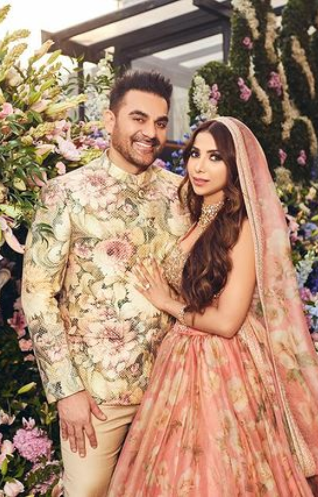 In an atmosphere of love and celebration, Arbaaz Khan and Shura Khan joyfully tie the knot, signifying the start of their wonderful journey together.
