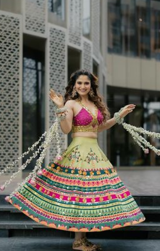 In her green lehenga, Arti looked amazing, her graceful silhouette enhancing her beauty as she embraced the customs of the Haldi ceremony