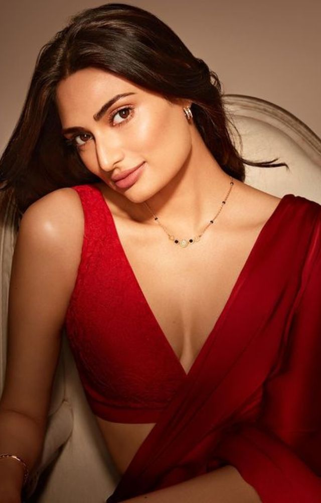 Athiya Shetty looks enchanting in a red saree, setting the mood for a dreamy and romantic date.