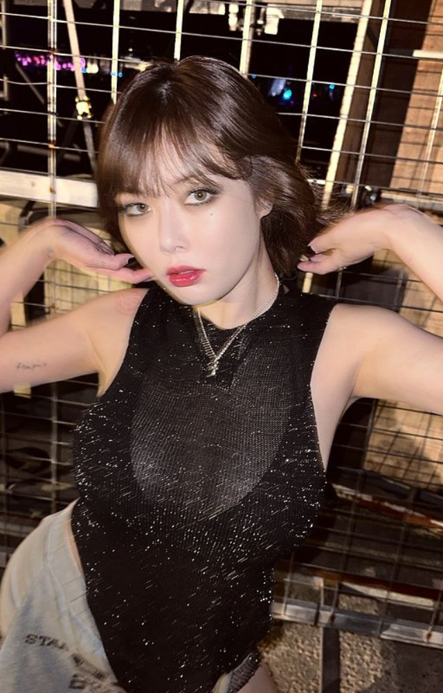 The solo artist rocked the stage in a black sheer top and mini skirt, creating a buzz online, even though bold fashion choices are nothing new in her long-standing career.