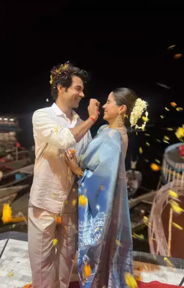 Mr. and Mrs. Mahi exchange a charming look during a relaxed time at the beautiful place of the Banaras.