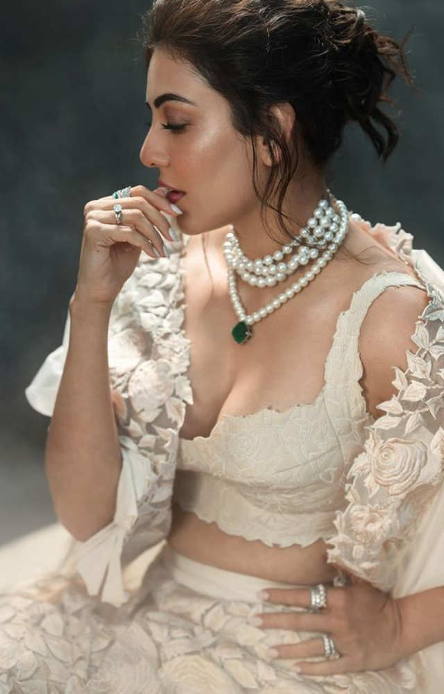 The post, titled `vintage vibes,` credits her talented team including stylist, designer, jeweler, makeup artist, hairstylist, and photographer.
