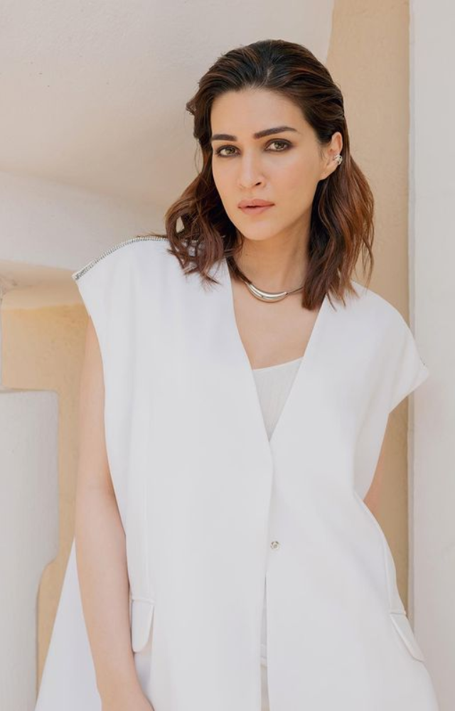 In a crisp white gown, Kirti Sanon dazzles, radiating elegance and sophistication while winning hearts with her classic taste.