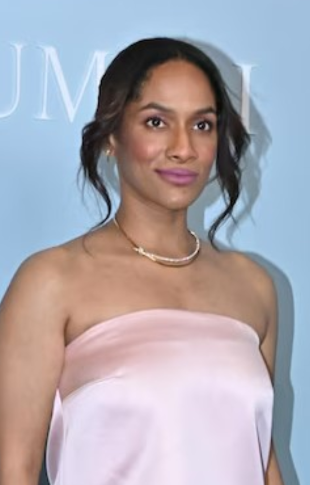 Masaba displays elegance in a gorgeous pink gown with a figure-flattering design and elaborate artwork.