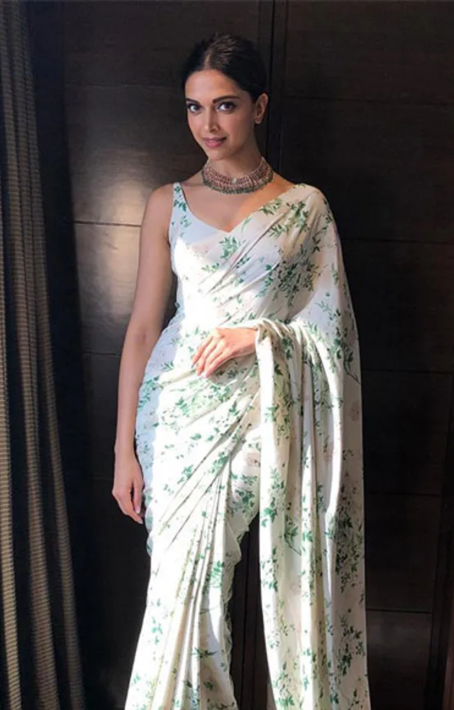 Embrace the festive magic with these exquisite attires, channeling the elegance of Deepika Padukone