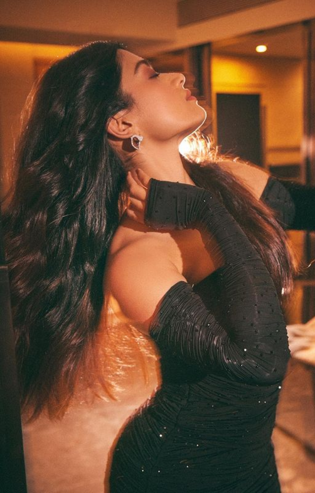 With her flawless style and compelling personality, Rashmika Mandanna exudes elegance and sophisticated charm when dressed in a sleek black attire.