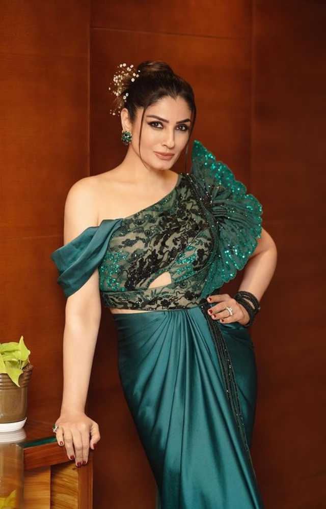 Raveena Tandon`s elegance knows no bounds as she graces the scene in green, a vision of grace and sophistication that transcends eras.
