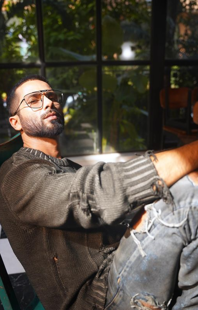 Shahid Kapoor epitomises casual elegance with ease while sporting a dark grey woollen top, exhibiting the ideal balance of comfort and style.