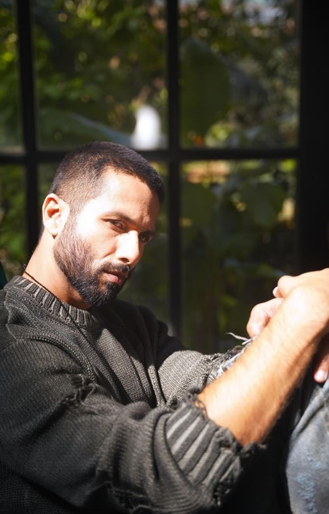 Shahid Kapoor embraces the look by donning a dark grey woollen top and skillfully fusing his distinctive charm with warmth and style.