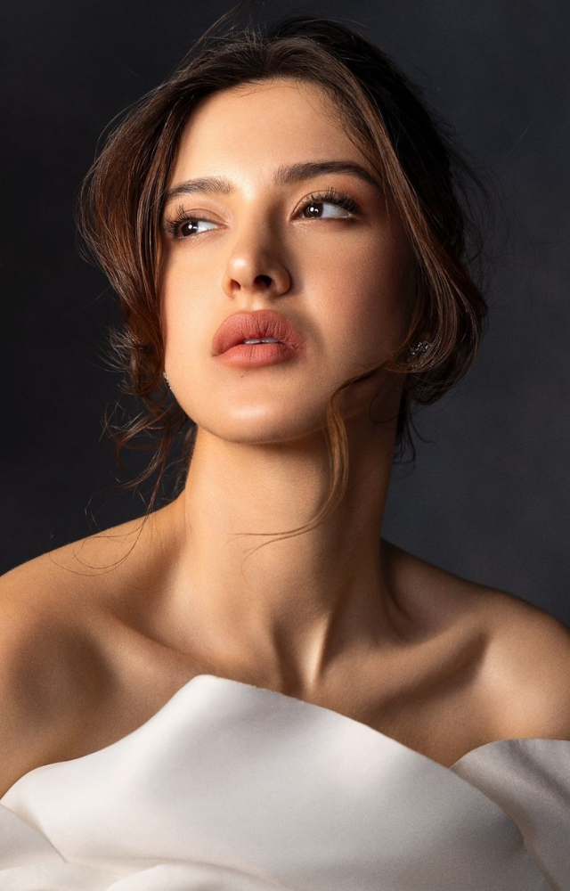 Shanaya Kapoor`s Ethereal White Rose Gown Photoshoot Leaves Viewers Spellbound with its Timeless Charm.
