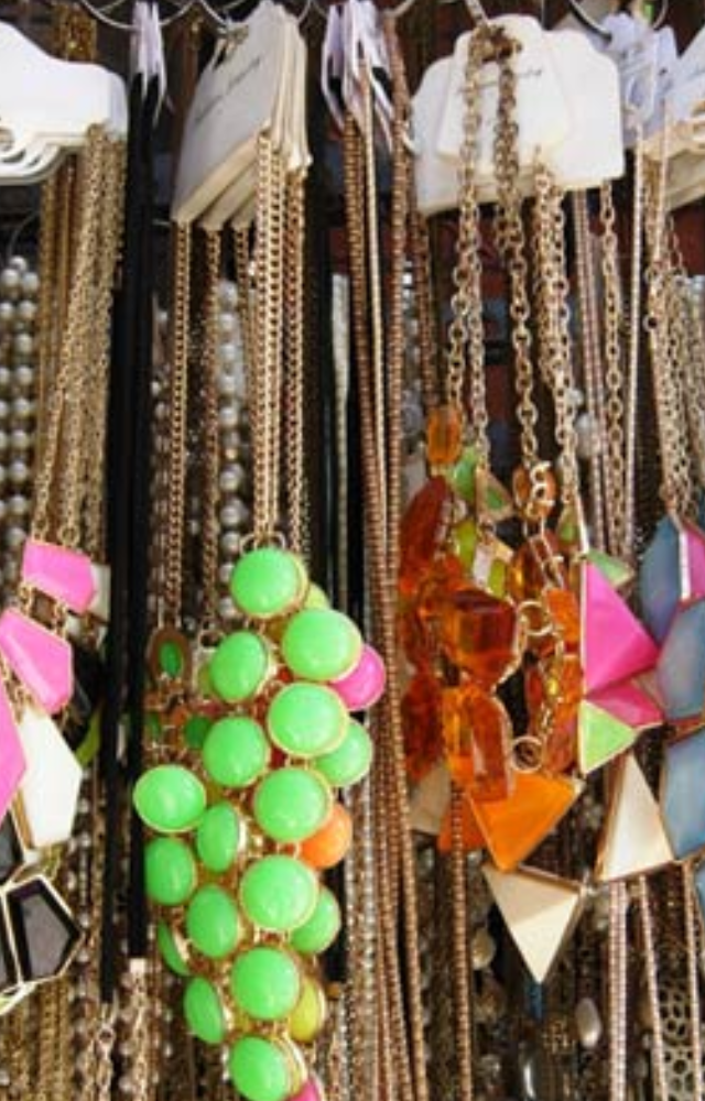 Look through a variety of upscale boutiques and street sellers selling fashion-forward apparel, accessories, and shoes.