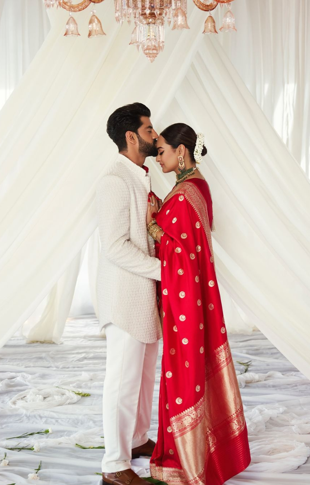 The newlyweds are painting the town red with their love and amazing ensembles. While Sonakshi looked stunning in a red saree, Zaheer opted for a white kurta.