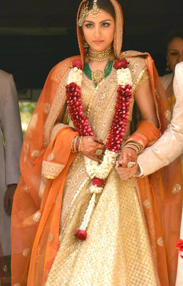 The actress donned an ivory and gold lehenga crafted by Sabyasachi Mukherjee.