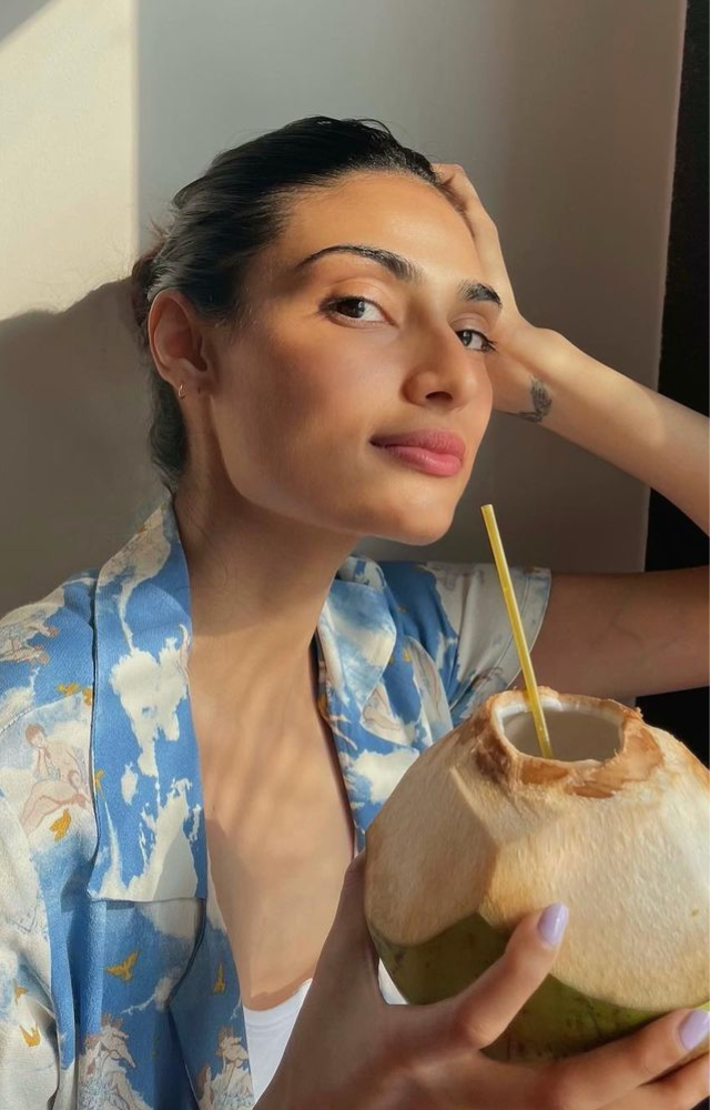Actress Athiya Shetty follows the cool habit of drinking coconut water in the heat of the summer to stay hydrated and keep her glowing skin