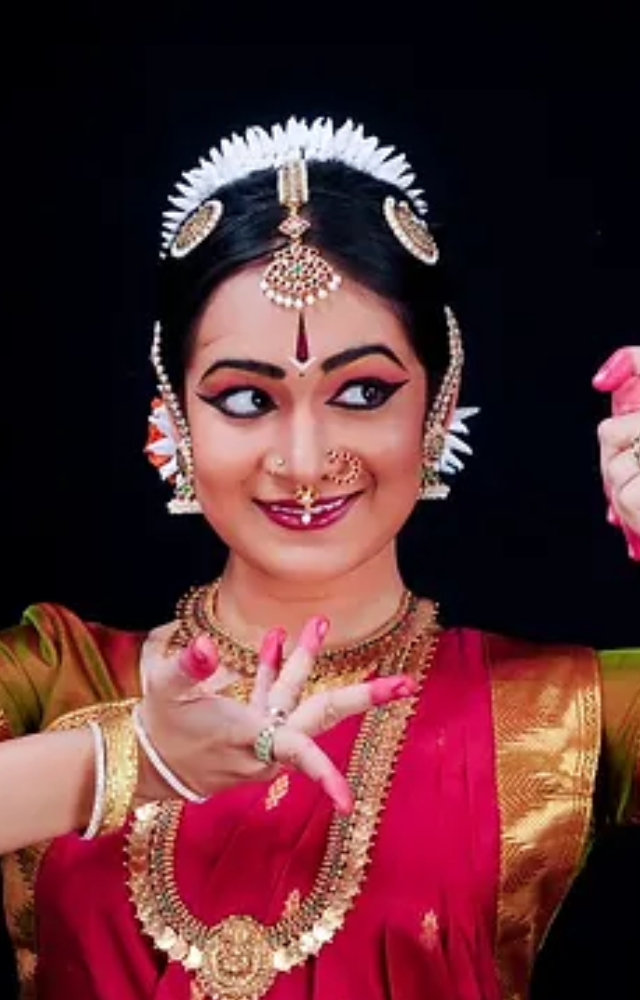 Bharatanatyam, which originated in Tamil Nadu, is distinguished by its precise footwork, elaborate hand gestures, and expressive face expressions
