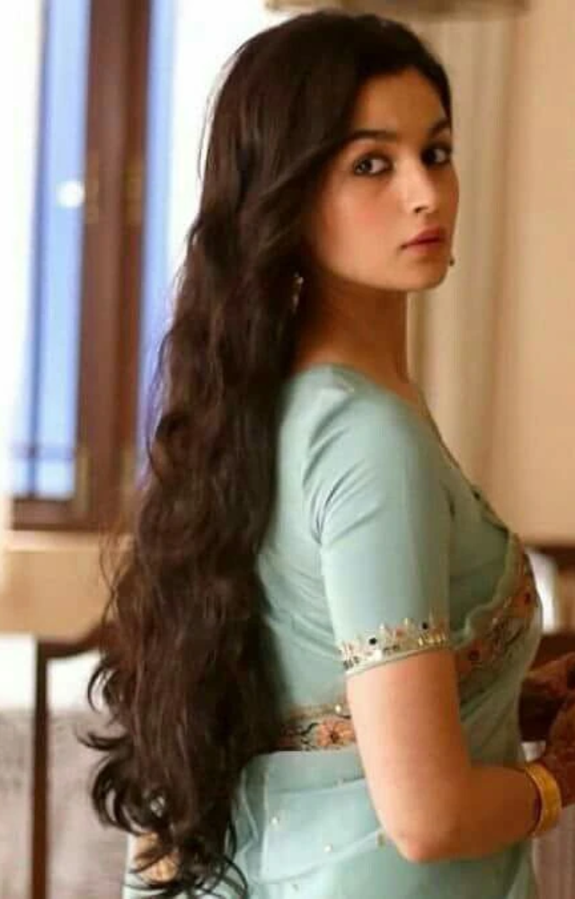 In Raazi, Alia plays a brave Indian spy, showcasing her powerful acting and strong presence.