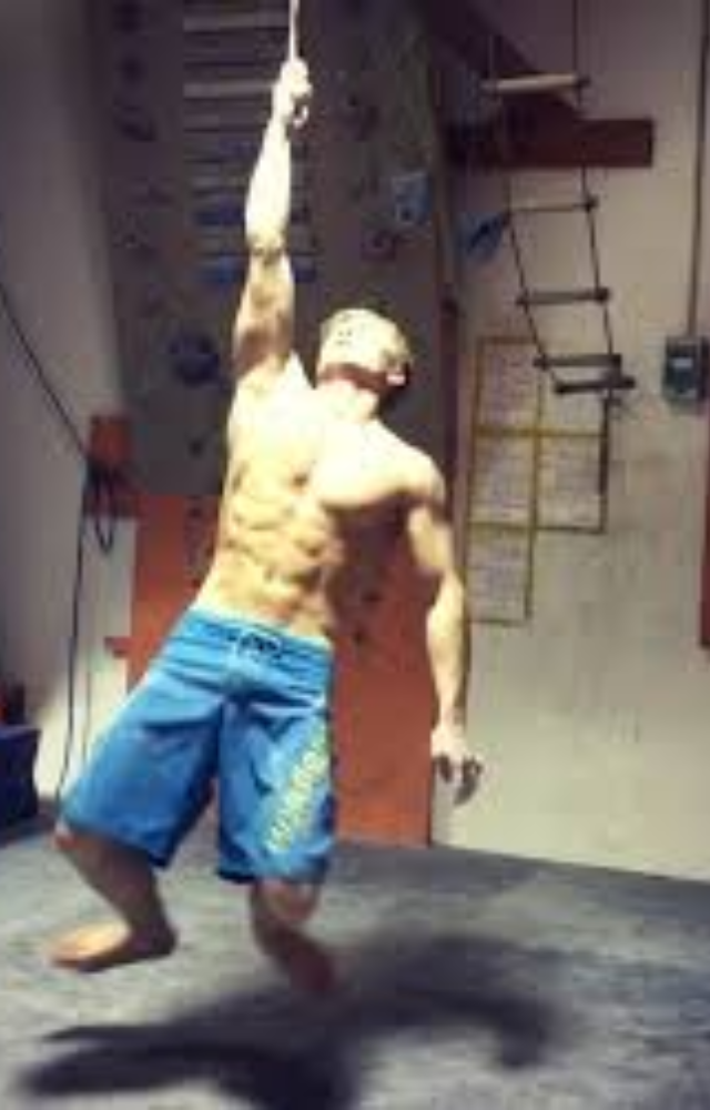 Train your grip and upper-body strength with this insane move—Baki style. Start with normal pull-ups before attempting this beast!
