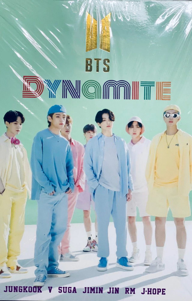 BTS’ “Dynamite” is a global sensation with its retro disco beats and uplifting vibes, making it an unforgettable K-pop anthem.