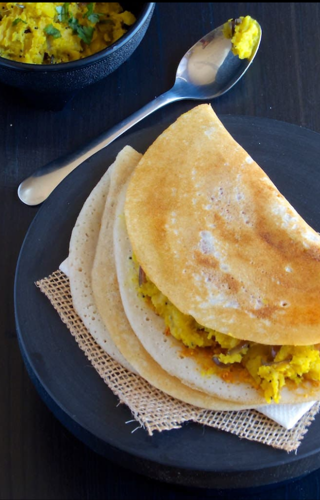 A crispy rice crepe filled with spiced potato masala—crunchy, hearty, and comforting all at once.