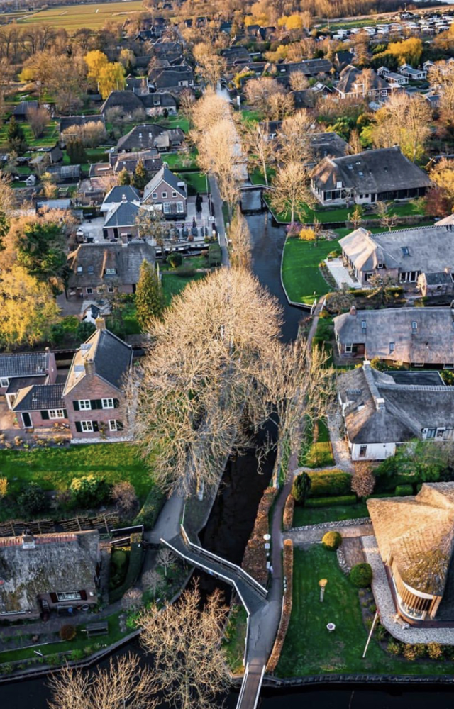 Known as the “Venice of the North,” this charming village has canals instead of roads. Boats and bikes rule here.