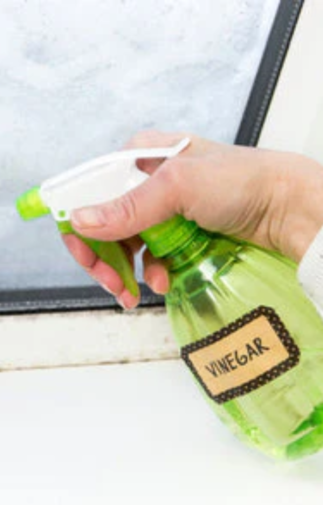 Use white vinegar and water in a spray bottle to get streak-free mirrors and windows. Say goodbye to cloudy reflections.