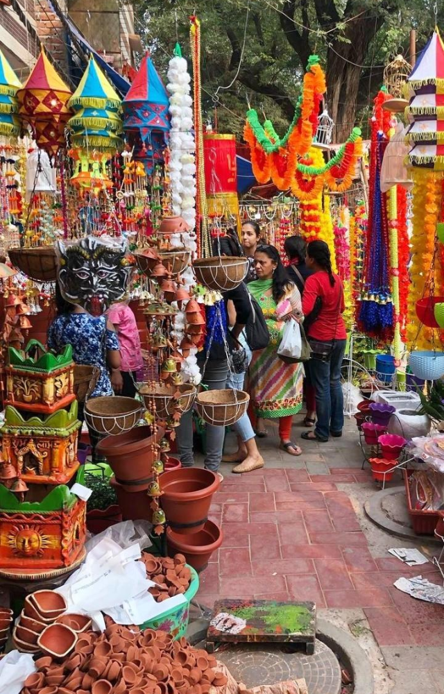 Dive into the colorful chaos of Chandni Chowk for traditional decorations like lanterns and diyas, perfect for Diwali.
