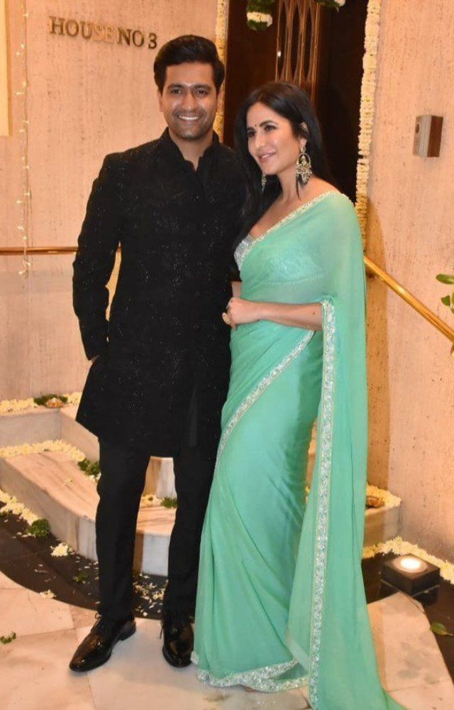 The power couple always stuns in traditional attire, setting trends with their festive looks.