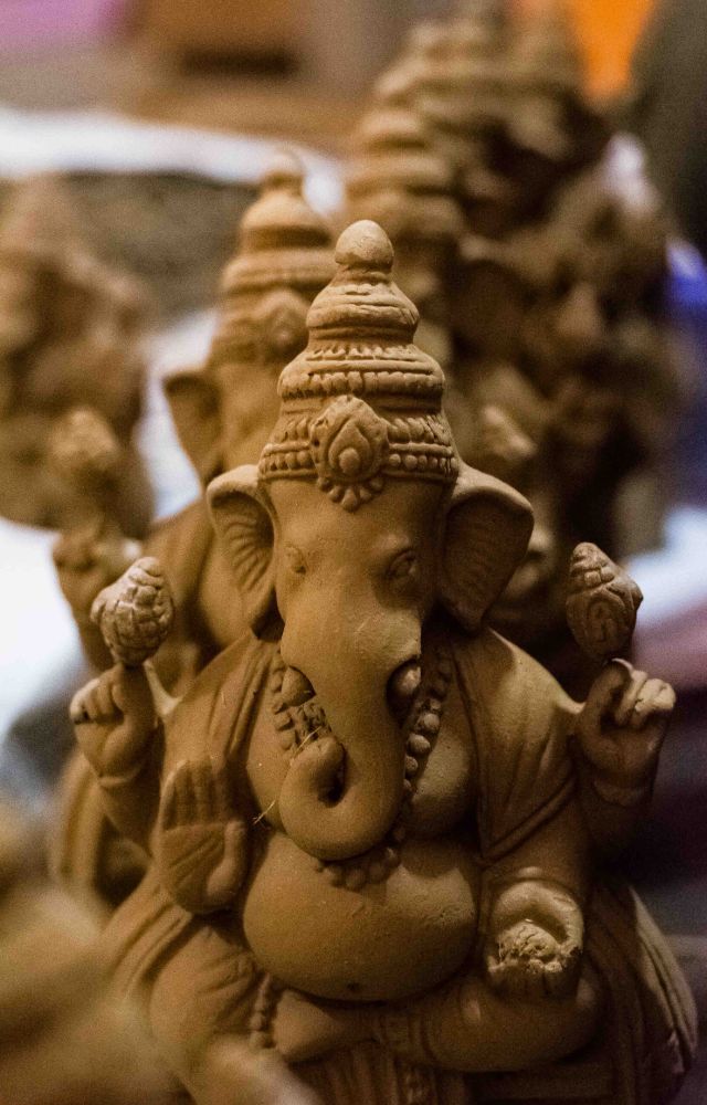 Crafted with seeds embedded in clay, these idols can be planted after immersion, growing into plants or trees.