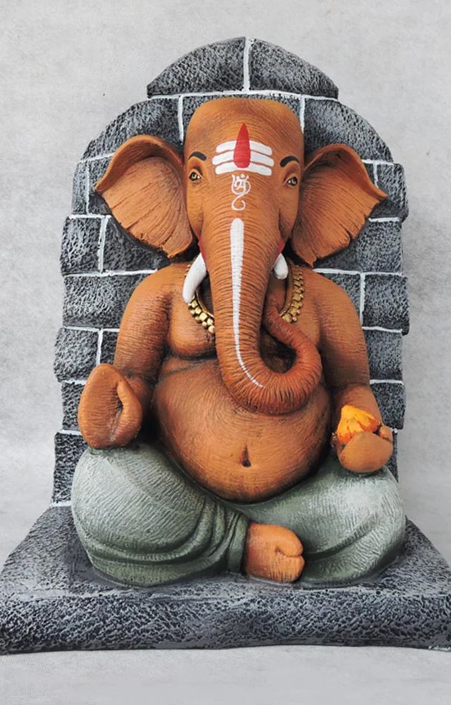 The curved trunk form symbolizes overcoming obstacles and challenges with wisdom and strength.