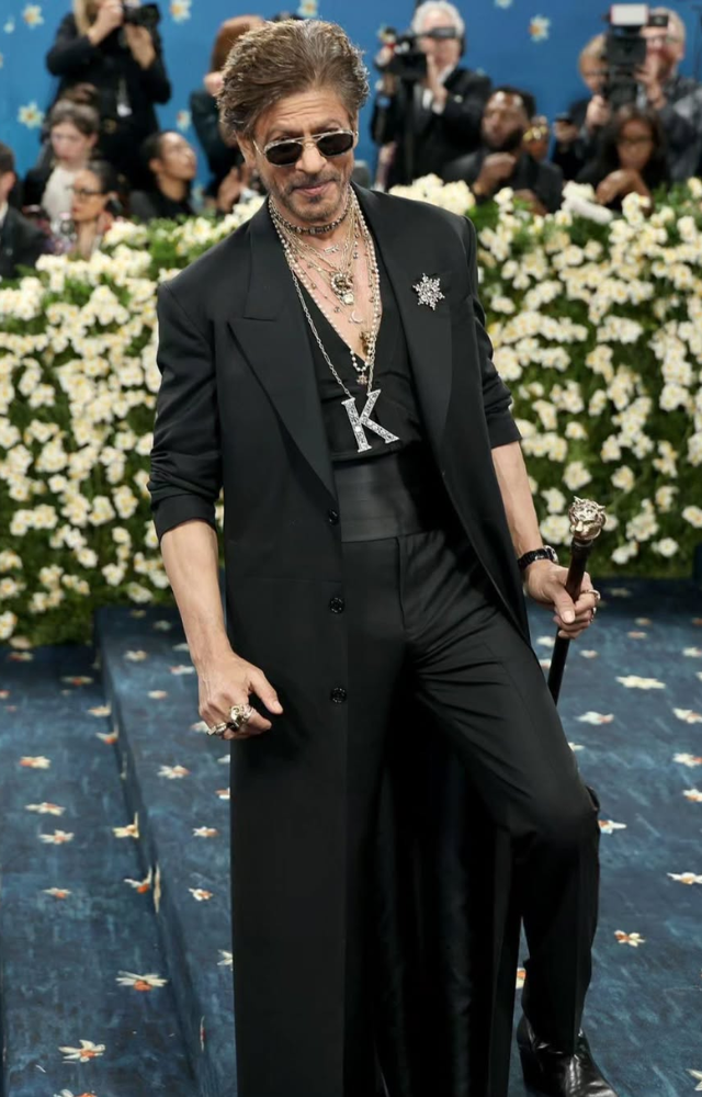 Shah Rukh Khan made a historic Met Gala debut in a regal Sabyasachi creation, becoming the first mainstream Bollywood actor to walk the Met steps.
