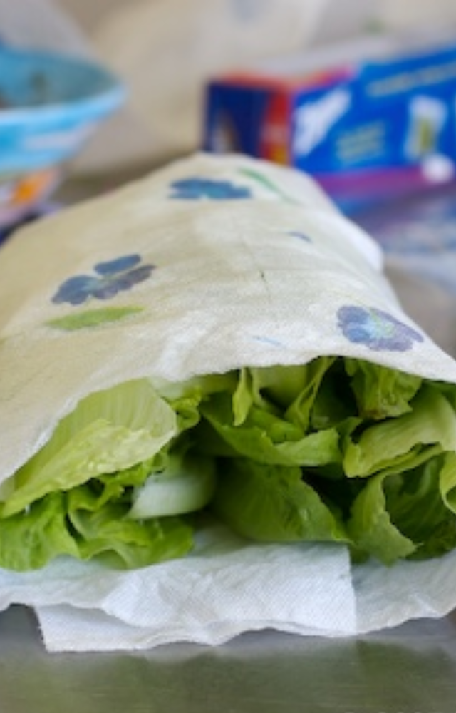 Line storage containers with paper towels for leafy greens. It absorbs moisture and prevents premature wilting.
