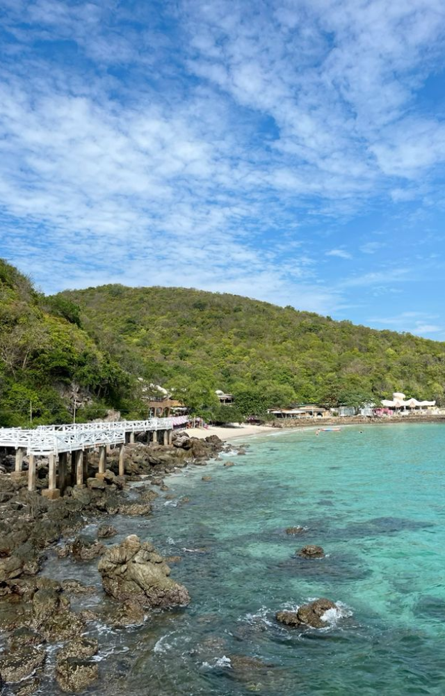 Far less crowded than Phuket, this beach offers peace, turquoise waters, and palm-lined shores.
