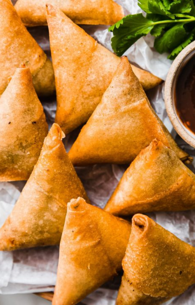 Crispy, golden pastries filled with spicy potatoes are perfect for any snack craving. A classic treat you can never say no to!