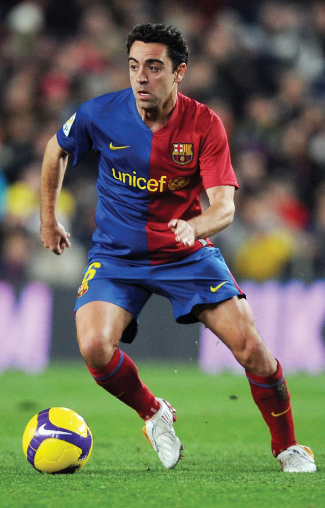 Barcelona’s midfield genius Xavi defined tiki-taka football with his vision and precision.