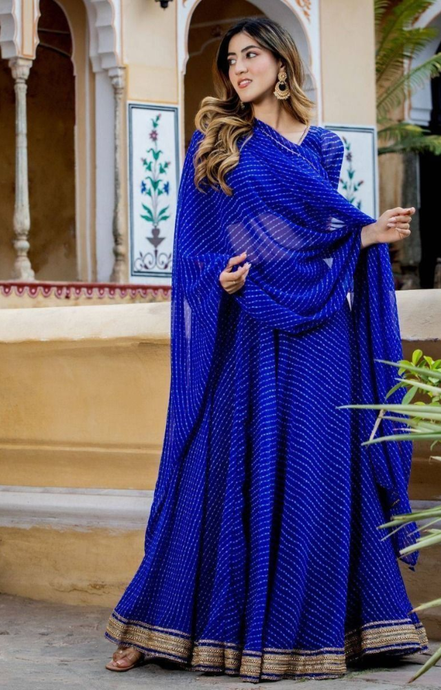 Opt for bold colors like royal blue, emerald green, and rich maroon to reflect the festive spirit.