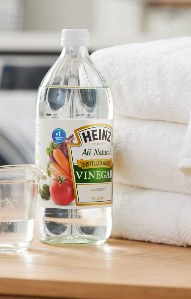 Skip fabric softeners—add half a cup of white vinegar to your rinse cycle for softer clothes.