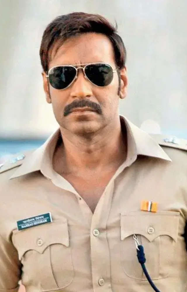 Ajay Devgn roars as the righteous cop in Singham, a film packed with power punches and fiery dialogues. A thrilling clash of justice and corruption.

