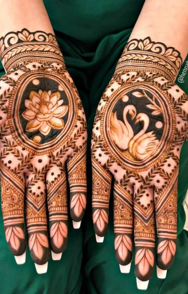 Symbolizing purity and elegance, lotus motifs are a classic choice. They beautifully enhance your festive ensemble.