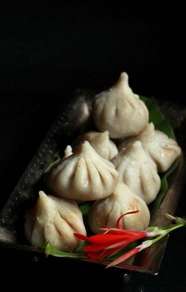 The traditional steamed modak, filled with jaggery and coconut, is a must-have during Ganesh Chaturthi.
