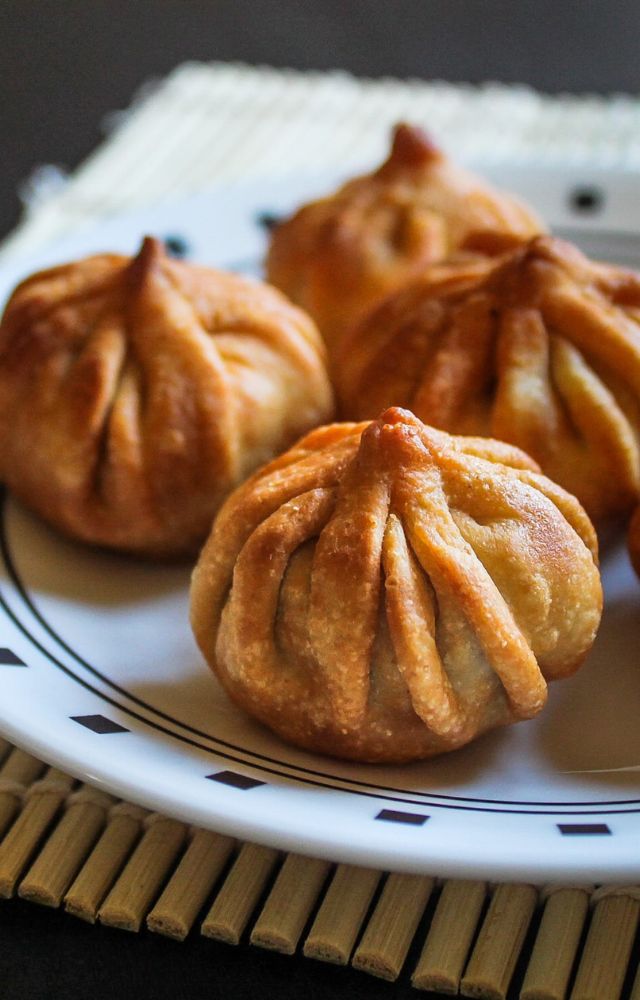 Crispy on the outside and soft on the inside, fried modak is a delightful variation with the same sweet filling.
