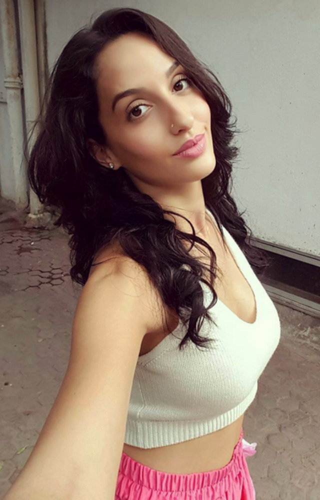 Nora Fatehi’s journey from Morocco to Bollywood was fueled by passion and determination.
