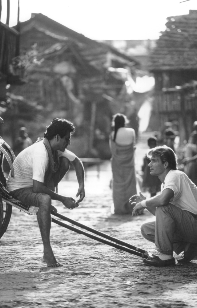 He portrays a rickshaw puller in Kolkata, capturing the city’s struggles and resilience.