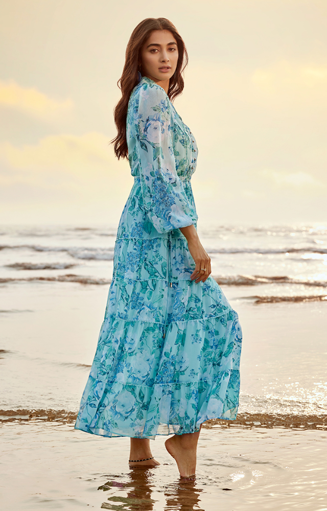 Pooja stuns in a bohemian-inspired beach look, perfect for a laid-back, sunny day by the sea.